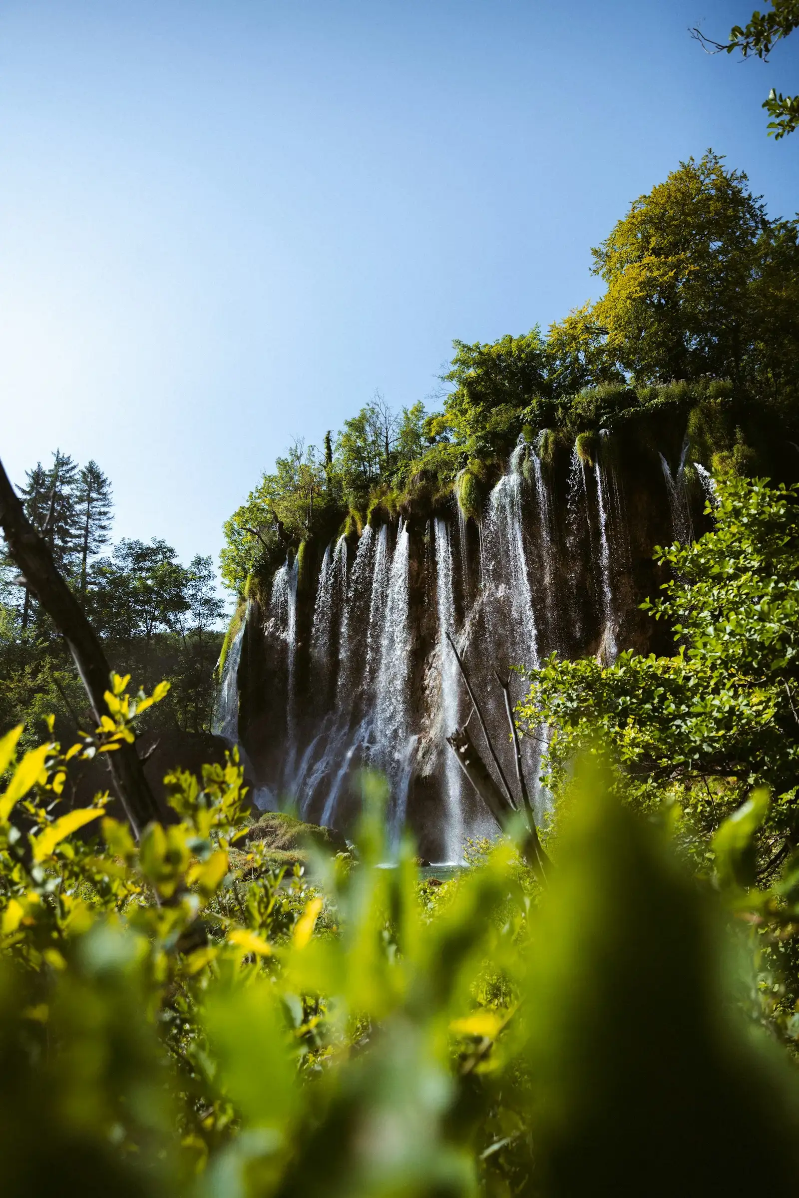Plitvice Lakes turquoise water cascading between levels